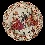 English Creamware Plates, Dutch Decorated, Prodigal Son, Scalloped Edge
Circa 1780-1800 Demi-flowerhead border within a scalloped molded edge 