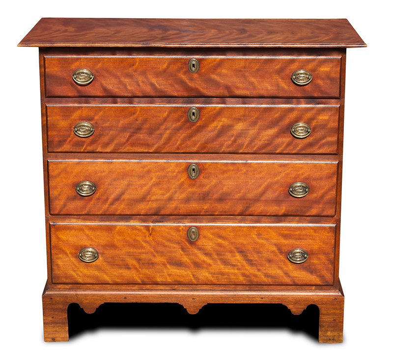 Chippendale Four Drawer Chest, Flame Birch, Original Brass & Red Stain
Likely Claremont or Walpole, New Hampshire (Based on construction related to others in group)
Birch and white pine
Circa 1780, entire view 1