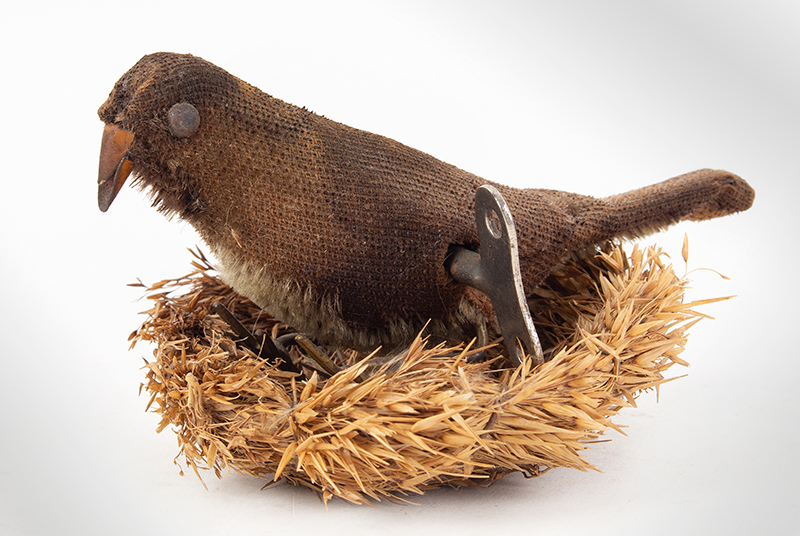 Cloth Covered Wind-up Bird (Wren) and Nest (New).
Tin Painted Beak and Feet., entire view