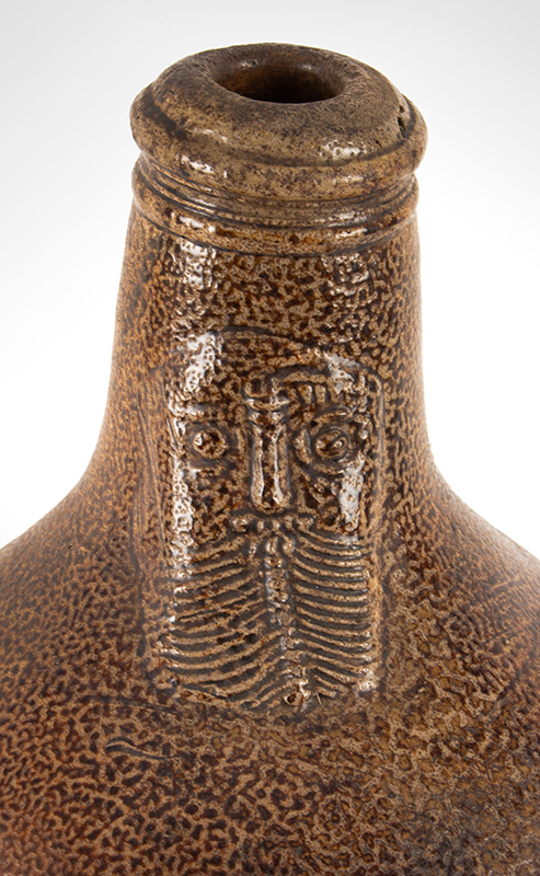 Antique Brown Salt Glazed Stoneware Ovoid Jug, Bellarmine Graybeard, Tiger Ware 
Germany, 17th Century
A massive example standing at 17-inches; beautifully tooled spout, ribbed handle, neck detail