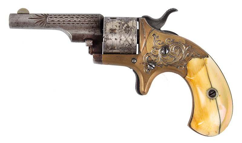 Colt Open Top Pocket Model Revolver, Engraved Special Factory Engraving Serial number: 62266, .22-Caliber Rim Fire, 7 Shot, left facing