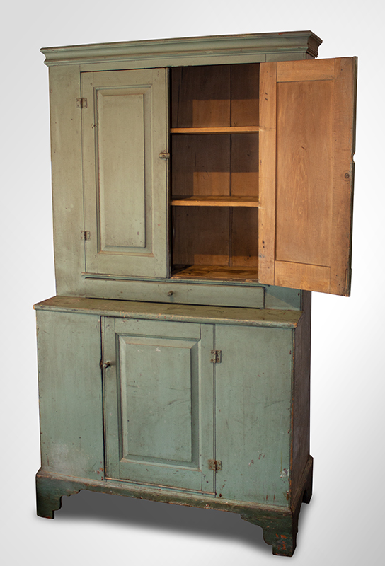 Antique Step-back Cupboard in Historic Surface, Raised Panel Doors, Small Size
New England, Likely Maine or New Hampshire, circa 1780-1820
Basswood, very early sage green paint over gray over red, entire view 2
