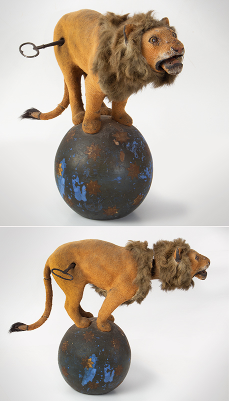 Large Lion Nodder on star decorated Globe, entire view