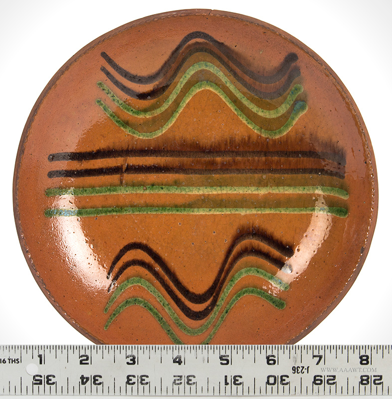 Redware Dish, Dryville Pottery, Pennsylvania, Green and Brown Four Quill Slip Dry Pottery, Active 1804-1880, Berks County, Pennsylvania, ruler view