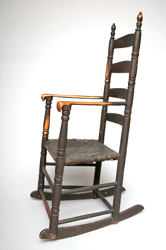 Ladder Back Rocking Chair, Human Effigy Arm Terminuses Extraordinary Example of Colonial and Native American Collaboration The arm terminals carved with faces are in the manner of the Penobscot Indians Coastal New England, Likely New Hampshire, or Maine, entire view