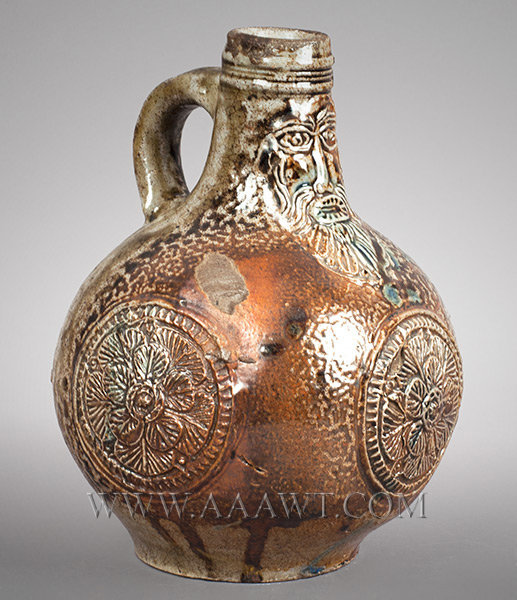 Salt Glazed Stoneware Jug, Dark Brown Tiger Ware, Bartmann, Applied Roundels
Germany
17th Century, angle view 2