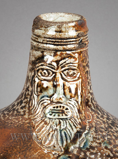 Salt Glazed Stoneware Jug, Dark Brown Tiger Ware, Bartmann, Applied Roundels
Germany
17th Century, top detail