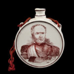 1121-87_1_Porcelain-Drum-Flask,-Sherman_view-1