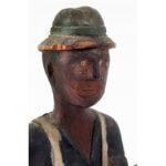 314-65_6_Carving,-Man-with-Pail_detail-2
