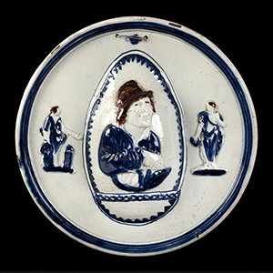Round Plaque with Miser Decoration Inventory Thumbnail