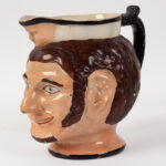 738-97_2_Jug,-Satur-with-Face