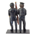 859-101_3_Carvings-of-Sailor-&-Solder