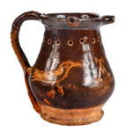 843-624_1_Earthenware-Puzz;e-Jug-with-Slip-Decoration