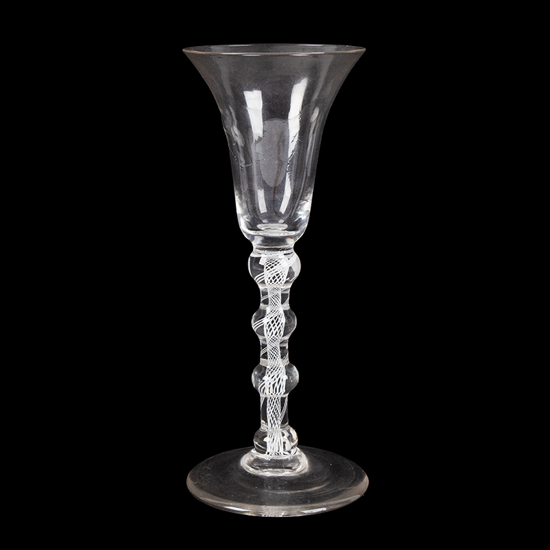 A Fine and Extremely Rare Four Knop Air Twist Georgian Wine Glass
