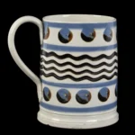 1490-63_1_Catseye Pearlware Tankard