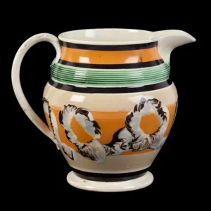 Mochaware Pitcher Featuring a Rare Engine Turned Empire Bulge Under Rim Inventory Thumbnail